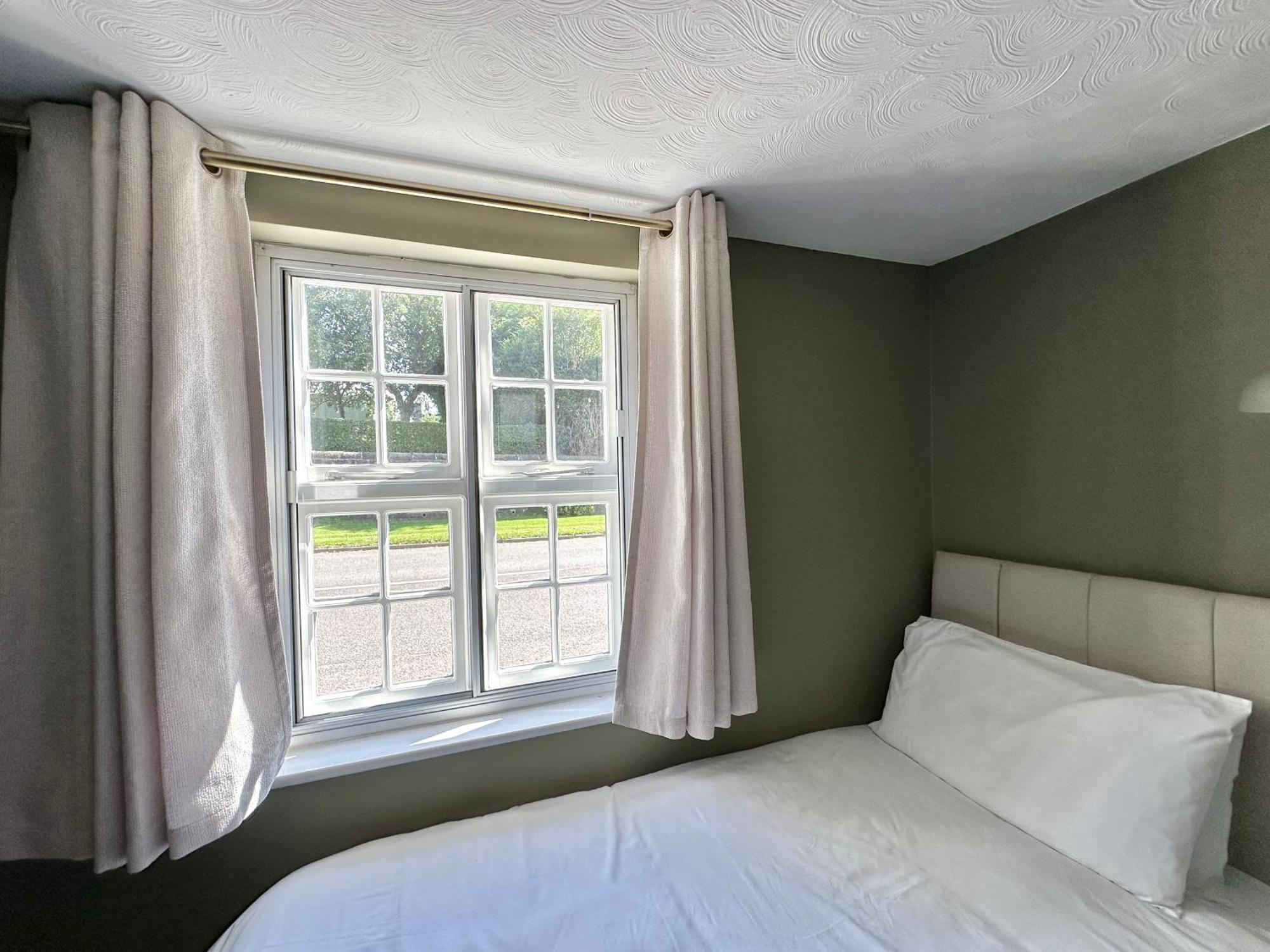 The Unicorn Inn Newton Solney Quarto foto